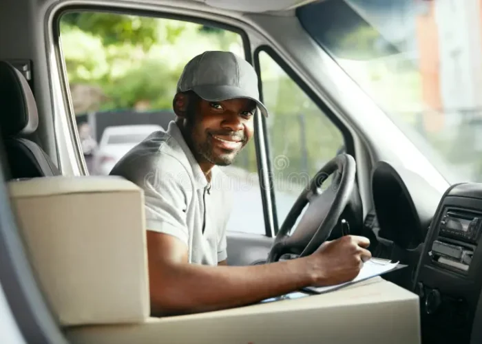 courier-delivery-black-man-driver-driving-car-boxes-packages-high-resolution-124918588 courier-delivery-black-man-driver-driving-car-boxes-packages-high-resolution-124918588